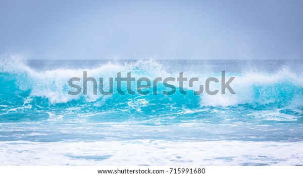 Beautiful splashing blue wave.