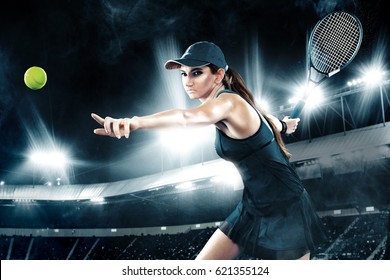 Beautiful Sport Woman Tennis Player With Racket In Blue Costume