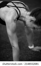 Beautiful Sporty Lady Doing Stretching At The Stadium, Practice Flexibility, Athletic Woman Training At Relaxation Pose, Recommended Healthy Lifestyle, Daily Workout Concept . High Quality Photo