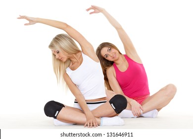 Beautiful Sporty Women Do Exercises On A White Background. Fitness.