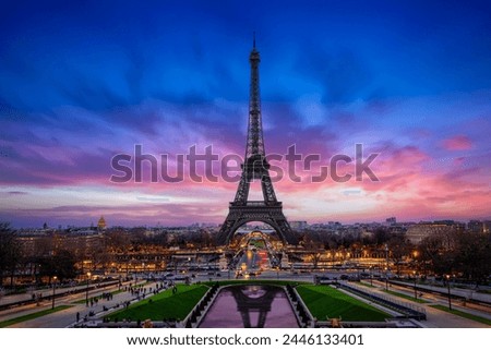 Beautiful spring dusk view of the Eiffel Tower and skyline of Paris, France