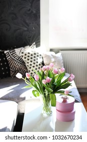 Beautiful Spring Image Of Spring Centerpiece On White Coffee Teable With Pink Tulips In A Glass Vase