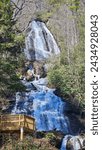 A beautiful spring landscape at Anna Ruby Falls with running water, rocks and lush green trees and plants in Unicoi State Park in Helen Georgia USA