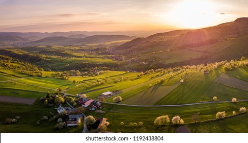 Beautiful spring landscape in Slovakia. Polana region, Hrinova, Europe. Fields and meadows with blooming cherries. - Shutterstock ID 1192438804