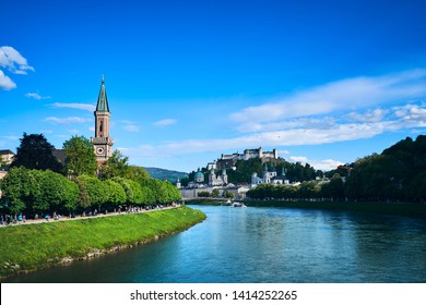 Beautiful spring view of cityscape and salzach river with Fortress Hohensalzburg in background, Salzburg, Austria - Powered by Shutterstock