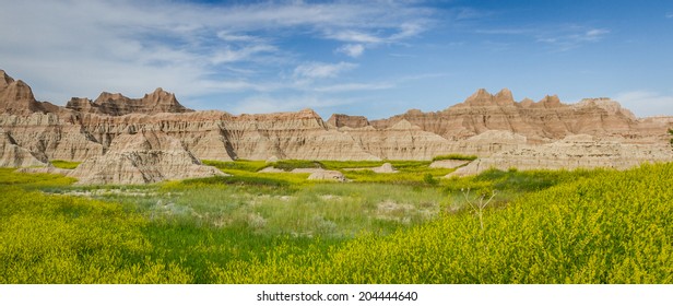 beautiful springtime landscape of the Badlands in south dakota with spring green grass