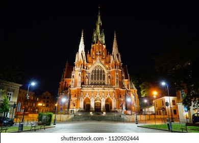 Beautiful  St. Joseph's Church A Historic Roman Catholic Church At Night In Podgorze District Of Krakow/Cracow, Poland.                   