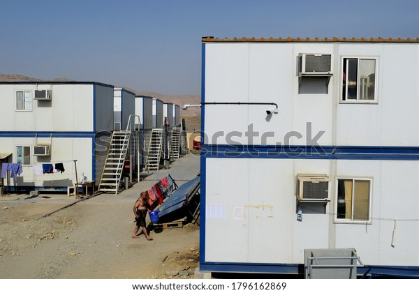 Beautiful Staircase\
in a Small House. Portable house and office cabins. Labor Camp.\
Porta cabin. small temporary houses : Muscat, Oman - 15-08-2020. \
porta cabin.\
portacabin.