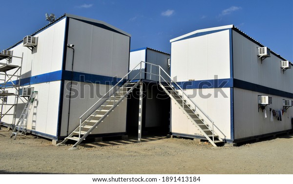 Beautiful\
Staircase in a Small House. Portable house and office cabins. Labor\
Camp. Porta cabin. small temporary\
houses