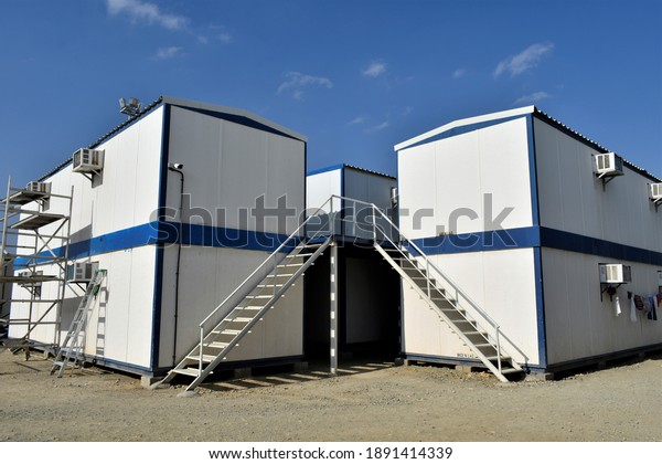 Beautiful
Staircase in a Small House. Portable house and office cabins. Labor
Camp. Porta cabin. small temporary
houses