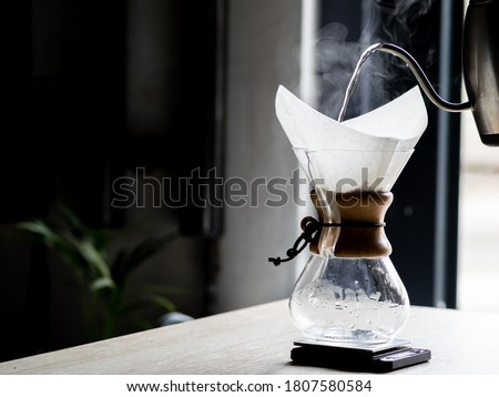 beautiful steam when brewing coffee. specialty coffee, a third-wave coffee shop. Coffee and coronavirus