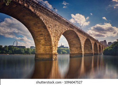 Beautiful stone arch bridge reflection on the Mississippi river,  Minneapolis Minnesota ,USA 