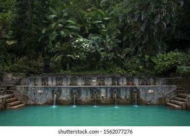 Beautiful stone pool with hot springs in the jungle of Bali