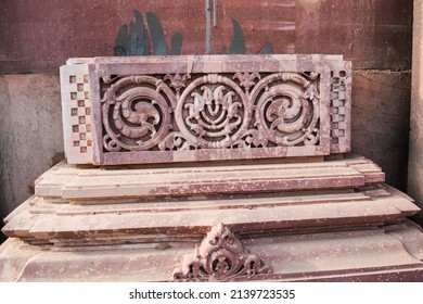 Beautiful stonework carved in hard stone. Carved stone design of floral and stem buds pattern in Indian temple. Stone carving in temple