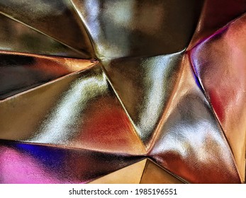 Beautiful Strange Rouge Shiny Gold Background. Golden Metal Wall In Rouge Color And Pattern.