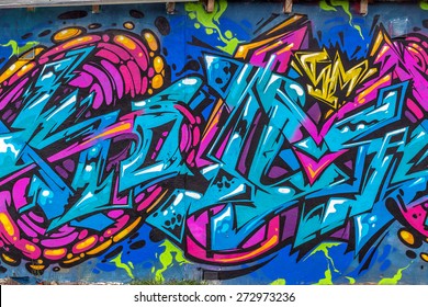 Beautiful street art graffiti. Abstract creative drawing fashion colors on the walls of the city. Urban Contemporary Culture - Shutterstock ID 272973236