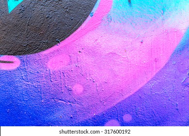 Beautiful street art graffiti. Abstract creative drawing fashion colors on the walls of the city. Urban Contemporary Culture - Shutterstock ID 317600192