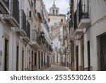 Beautiful street in the medieval town of Alburquerque (Extremadura) with old houses, some of them made of stone and full of balconies. One of the most beautiful villages in Extremadura.