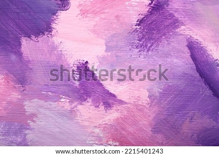 Beautiful strokes of pink and violet oil paints as background, closeup