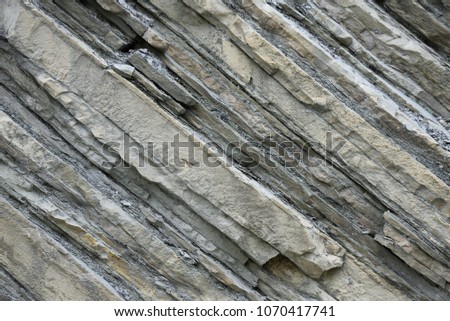 Beautiful structure of the rock, consists of a solid rock in the form of layers