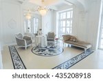 beautiful stylish chic rich clean bright blank interior. high white walls with large windows from floor the pattern on the floor