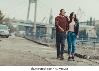 Beautiful Stylish Couple Walking By Industrial District
