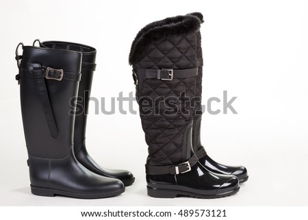 Similar – Image, Stock Photo Shiny rubber boots in the rain in front of a puddle-