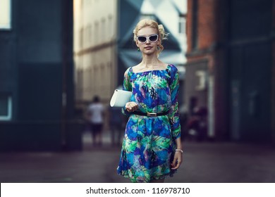 Beautiful Stylish Young Woman On A Street