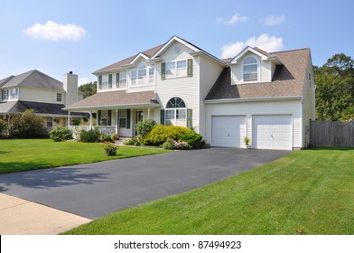 Beautiful Suburban Split Level McMansion Home Two Car Garage In Residential Neighborhood