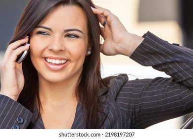 Beautiful Successful Happy Young Latina Hispanic Woman Businesswoman Smiling Laughing And Talking On Her Cell Phone Outside