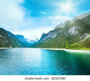 Beautiful summer Alpine  lake Gosausee view and sunshine in sky (Austria) - Shutterstock ID 82107340