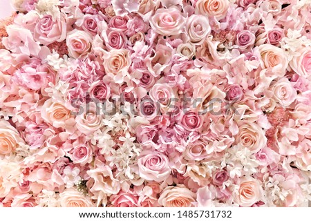 Beautiful summer flowers as background. Blossoming delicate roses on blooming flowers festive background, pastel and soft bouquet floral card.
