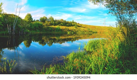 Beautiful Summer Landscape With Calm River At Sunset.