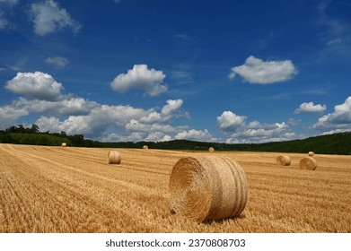 Beautiful summer landscape with haystacks - hay bales. Concept for nature, harvest time and end of summer. - Powered by Shutterstock
