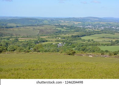 Beautiful Summer Landscape On Whitchurch Common, Dartmoor National Park,  Looking Down Over Green Fields Towards The Distant Coast, Devon, England.