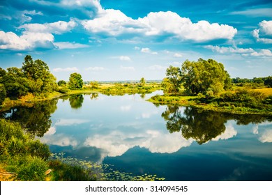 Beautiful Summer Landscape With River And Blue Sky In Belarus Russia