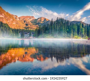 Beautiful summer scenery. Magnificent summer view of Braies Lake. Misty morning scene of Dolomite Alps, Naturpark Fanes-Sennes-Prags, Italy, Europe. Beauty of nature concept background.