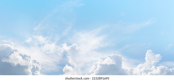 Beautiful summer sky wispy romantic cloudscape - wide pale blue with various cloud formations ideal for vacation holiday getaway travel theme or environment consciousness theme
 - Shutterstock ID 2152891695