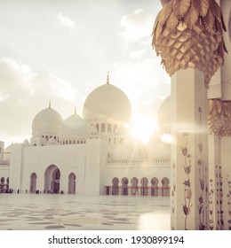 Beautiful sun rays beaming through spectacular domes of a mosque. Beautiful Islamic religious background.