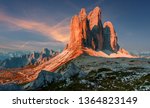 Beautiful Sunny morning in Dolomites Alps. Wonderlust view on highland with majestic Tre peaks of Lavaredo under sunlight. Tre Cime di Lavaredo national park during sunset. Amazing nature Landscape