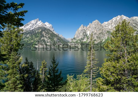 Beautiful sunny summer day view of Jenny Lake in Grand Teton National Park