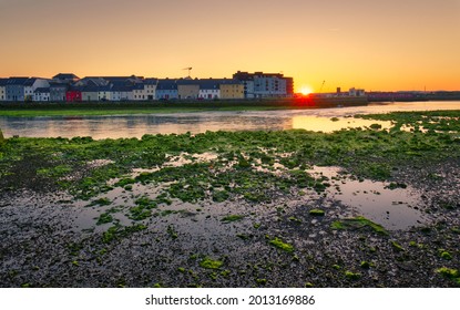 Beautiful sunrise cityscape scenery of Colorful houses at Claddagh by the Corrib River in Galway city, Ireland 