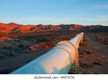 Beautiful sunrise lighting on a pipeline in the Mojave Desert.