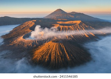 Beautiful sunrise at Mount Bromo volcano above sea of fog, the magnificent view of Mt. Bromo located in Bromo Tengger Semeru National Park, East Java, Indonesia. - Powered by Shutterstock