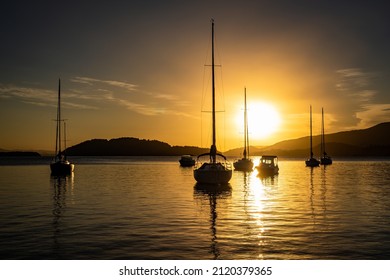 Beautiful Sunrise On Lake Nahuel Huapi With Boats