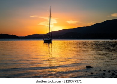 Beautiful Sunrise On Lake Nahuel Huapi With Boats