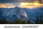 beautiful sunrise over half dome at sentinel dome in yosemite national park in california