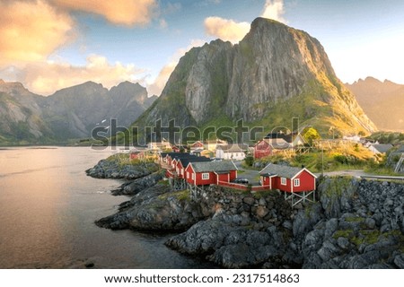 Beautiful sunrise over Hamnoy, fishermen village with the typical red houses of the Lofoten Islands, Norway Stock photo © 