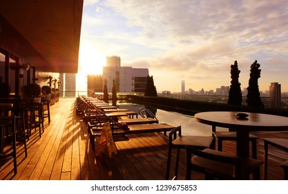 Beautiful Sunrise Over A Hotel Rooftop Swimming Pool On Penang Island, Malaysia