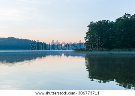 Similar – schöner Sonnenaufgang über dem See mit Pier und Yachten